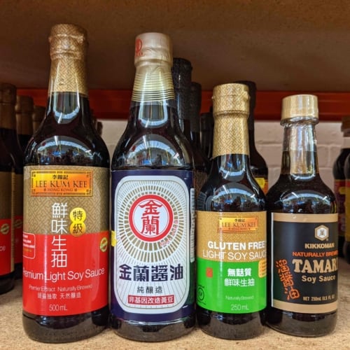 Three bottles of soy sauce and one bottle of tamari
