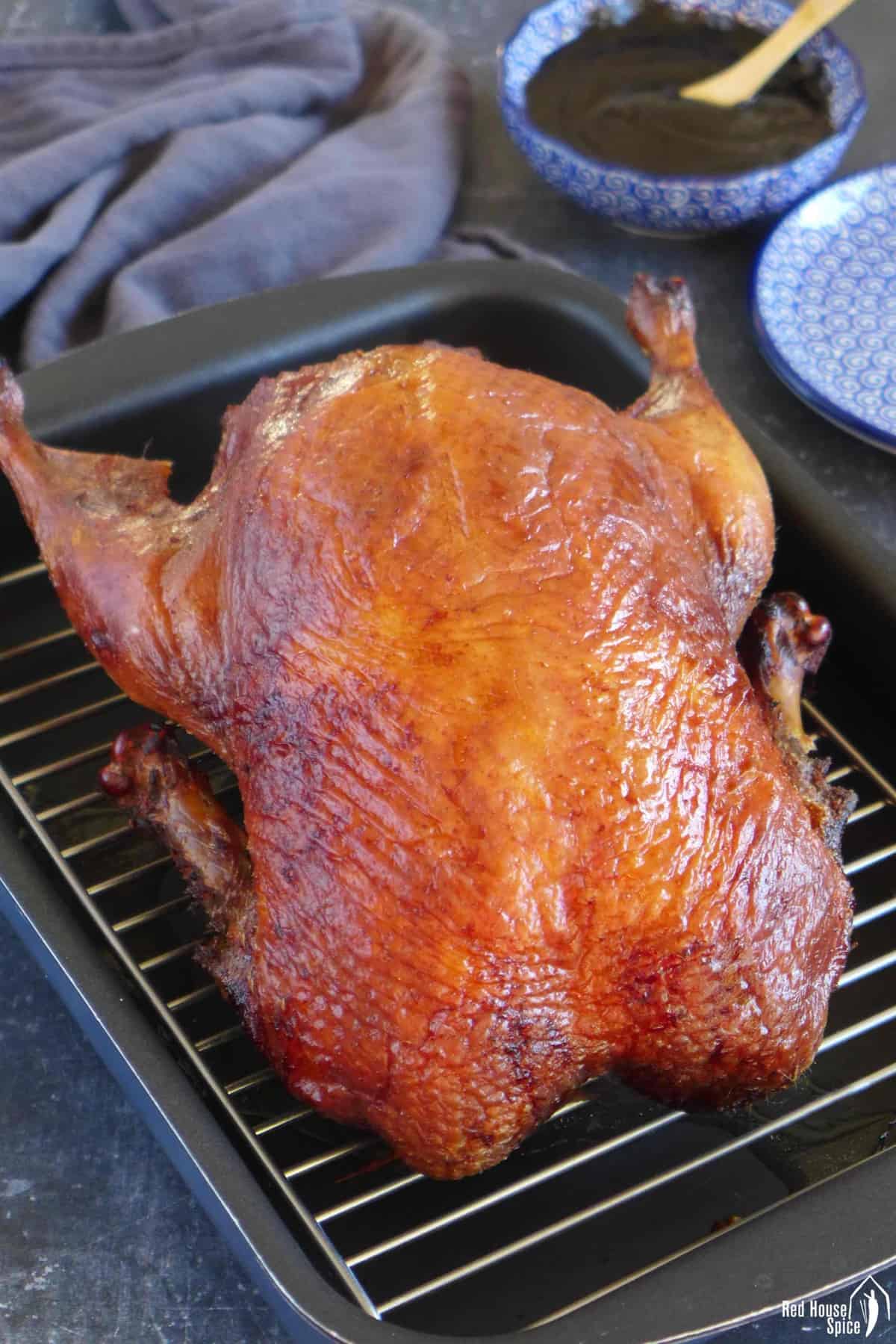 A golden looking roast Peking duck