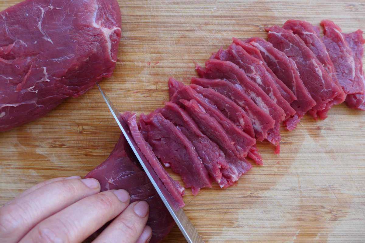 cutting beef into thin slices