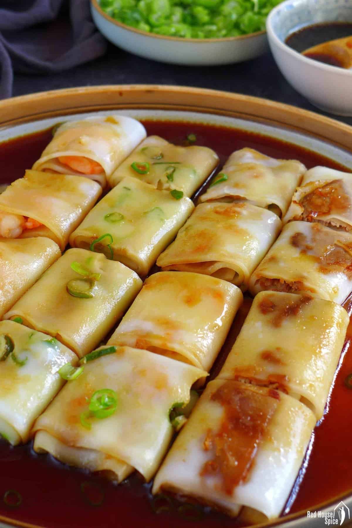 Cheung fun cut into pieces with the sauce