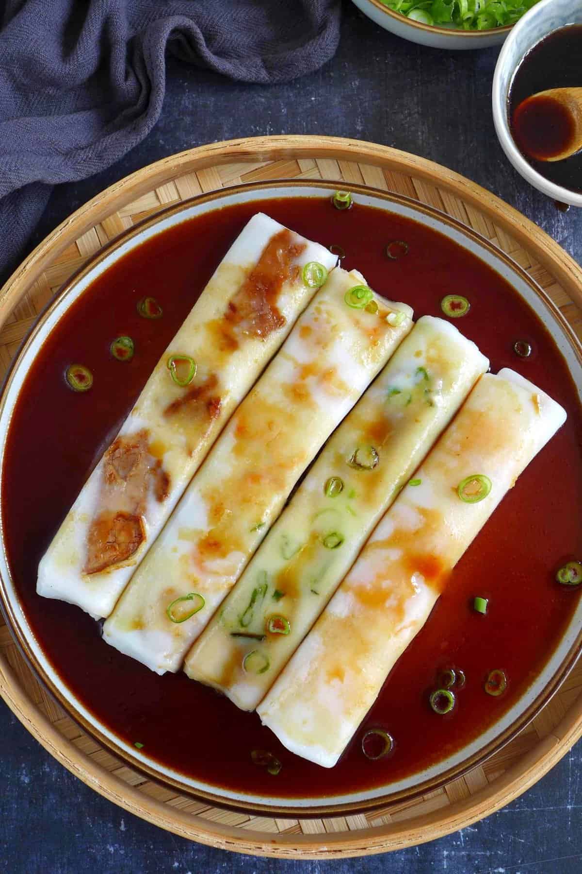 four rolls of Cheung fun with sauce