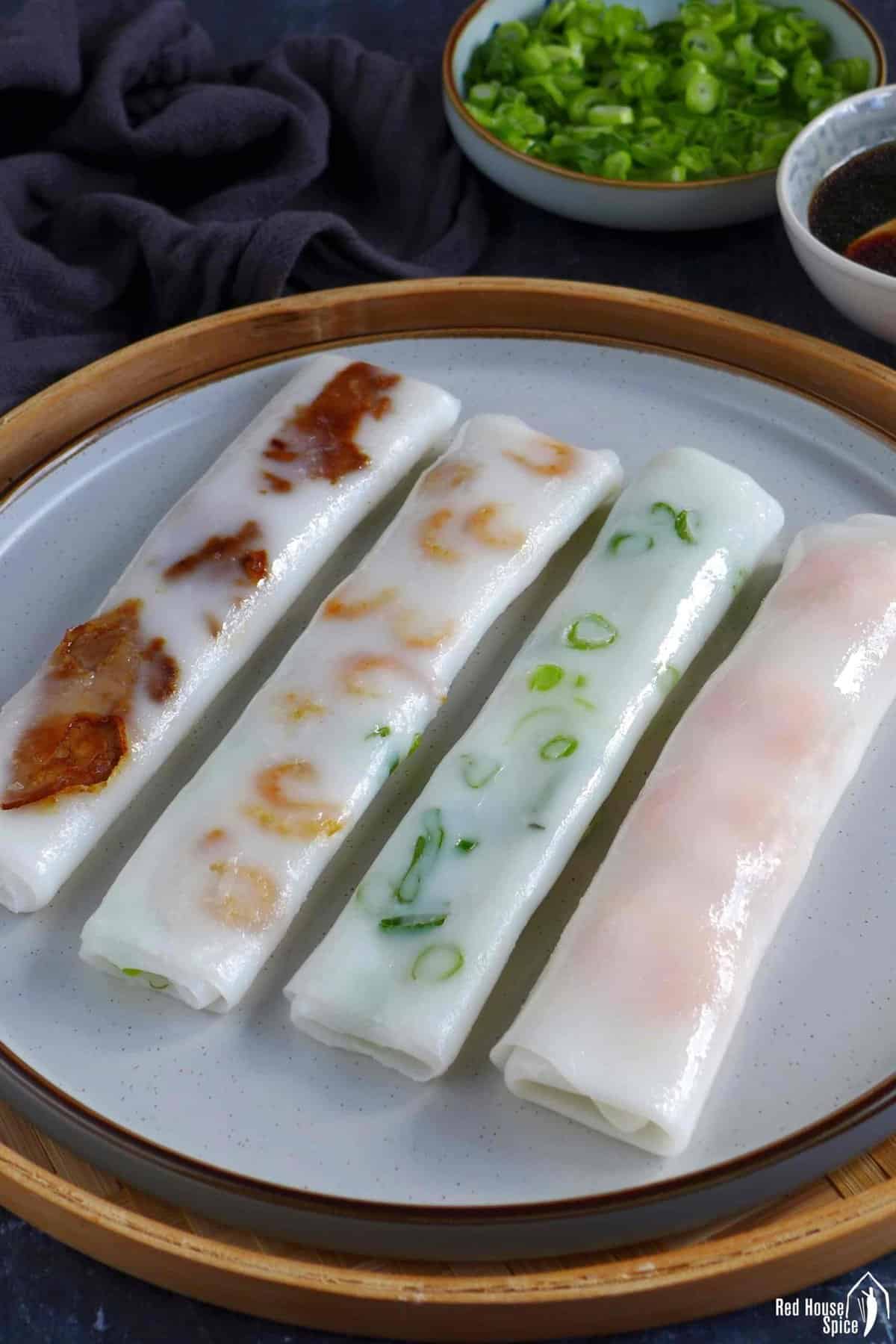 four rolls of Cheung fun with different fillings
