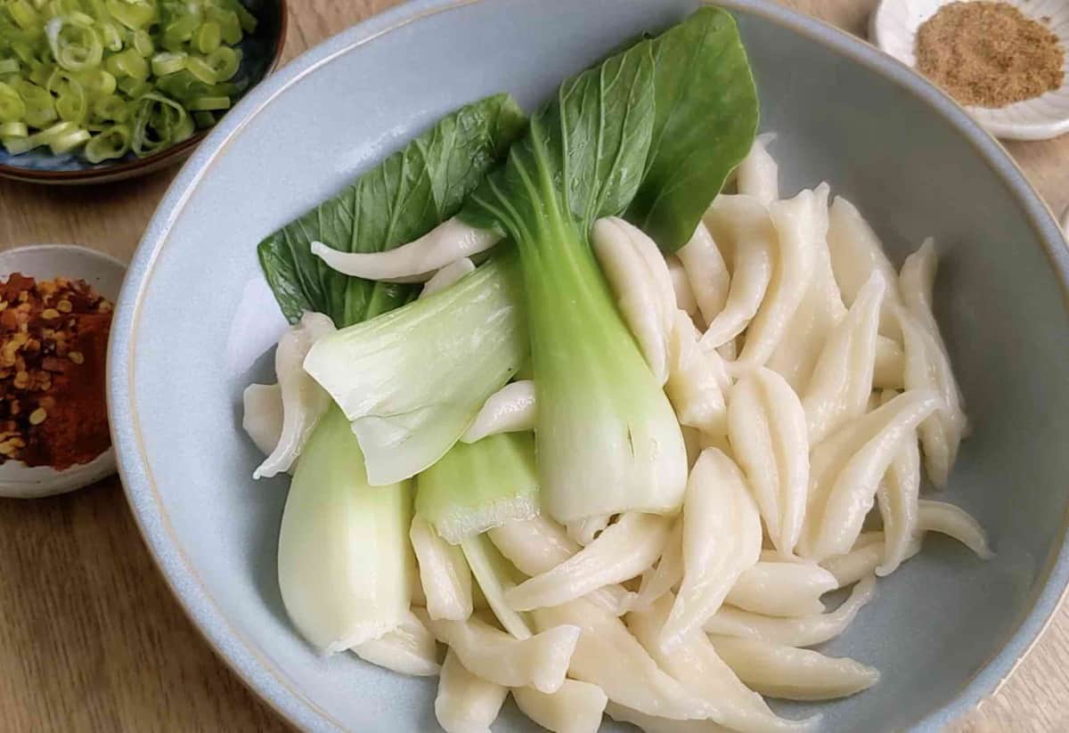 cooking noodles and Bok Choy