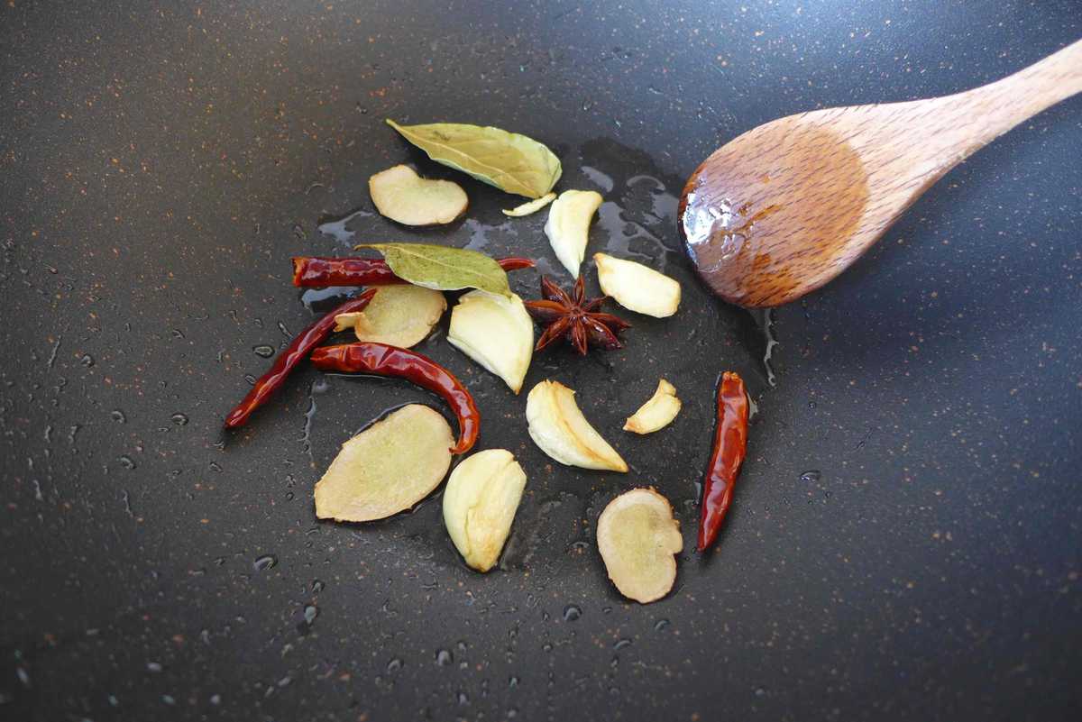 frying ginger, garlic and spices