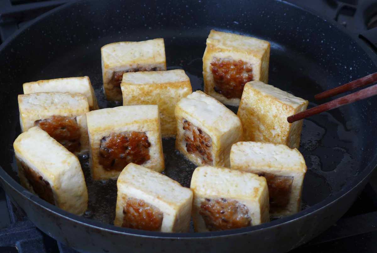 frying tofu blocks with filling