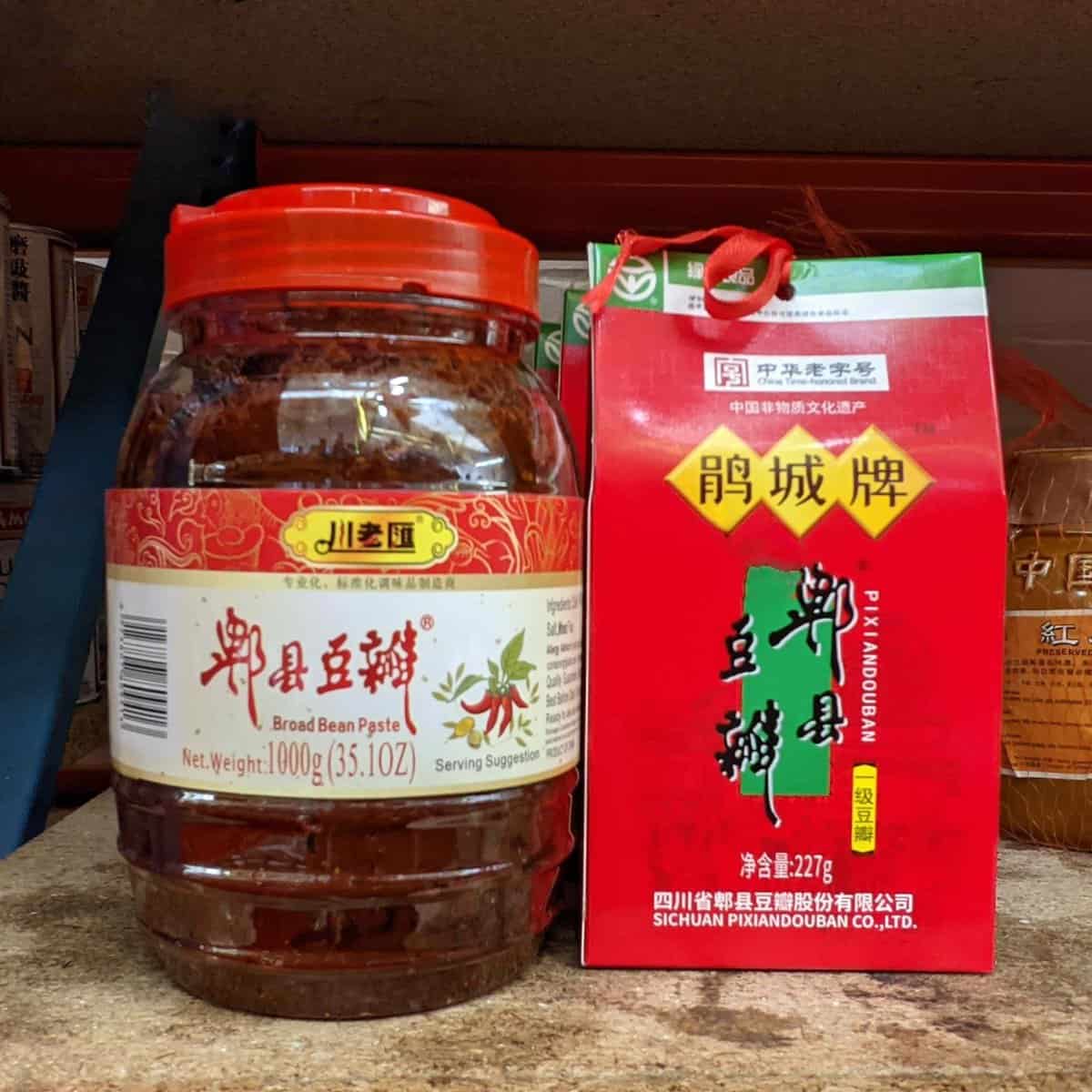 Pixian Douban in a jar and a paper packaging.