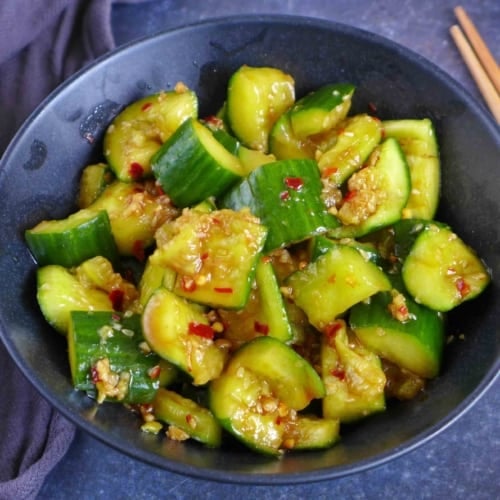 smashed cucumber pieces with dressing