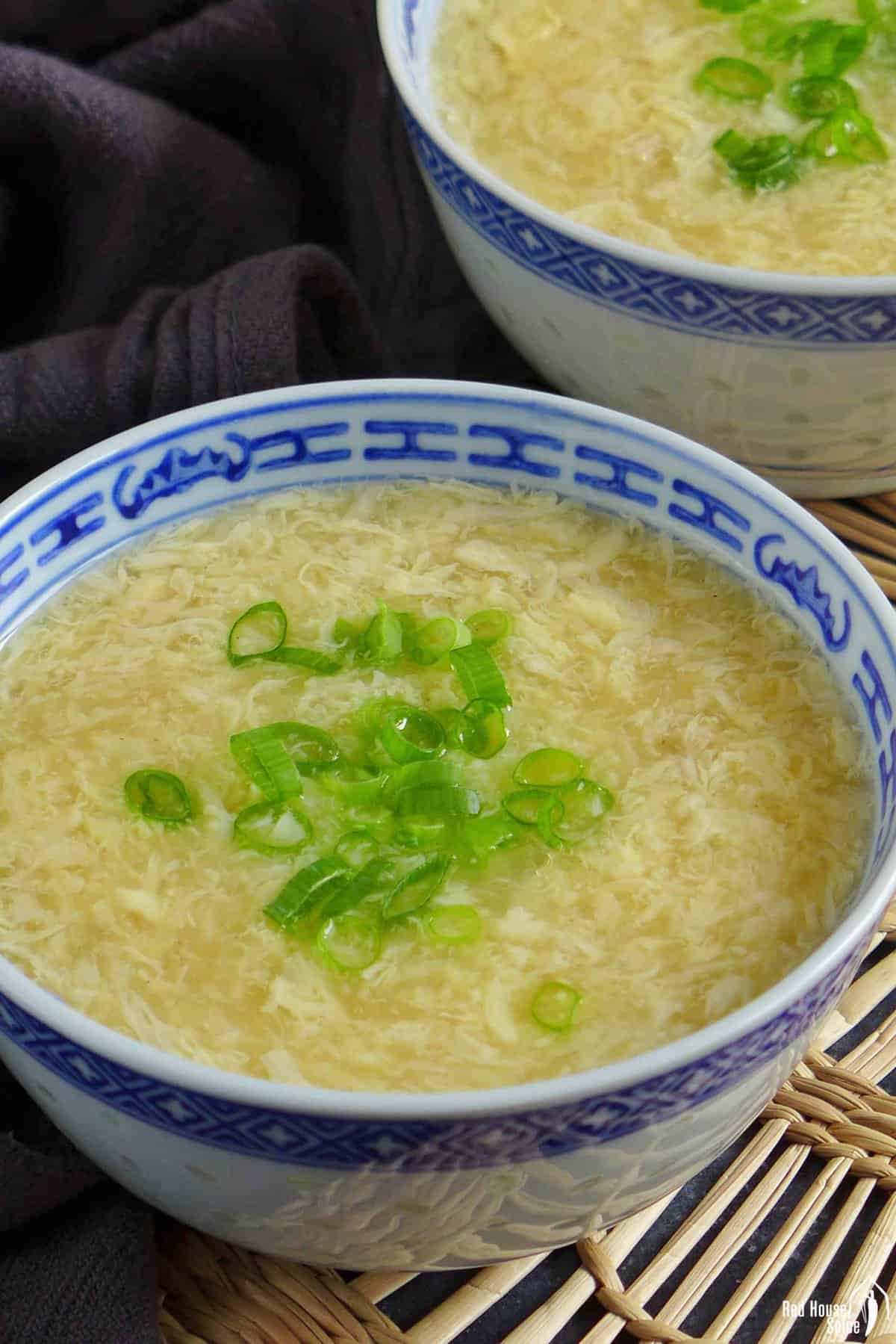 Soup with fine egg strands and scallions.