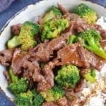 stir-fried beef and broccoli with overlay text that says beef and Broccoli.