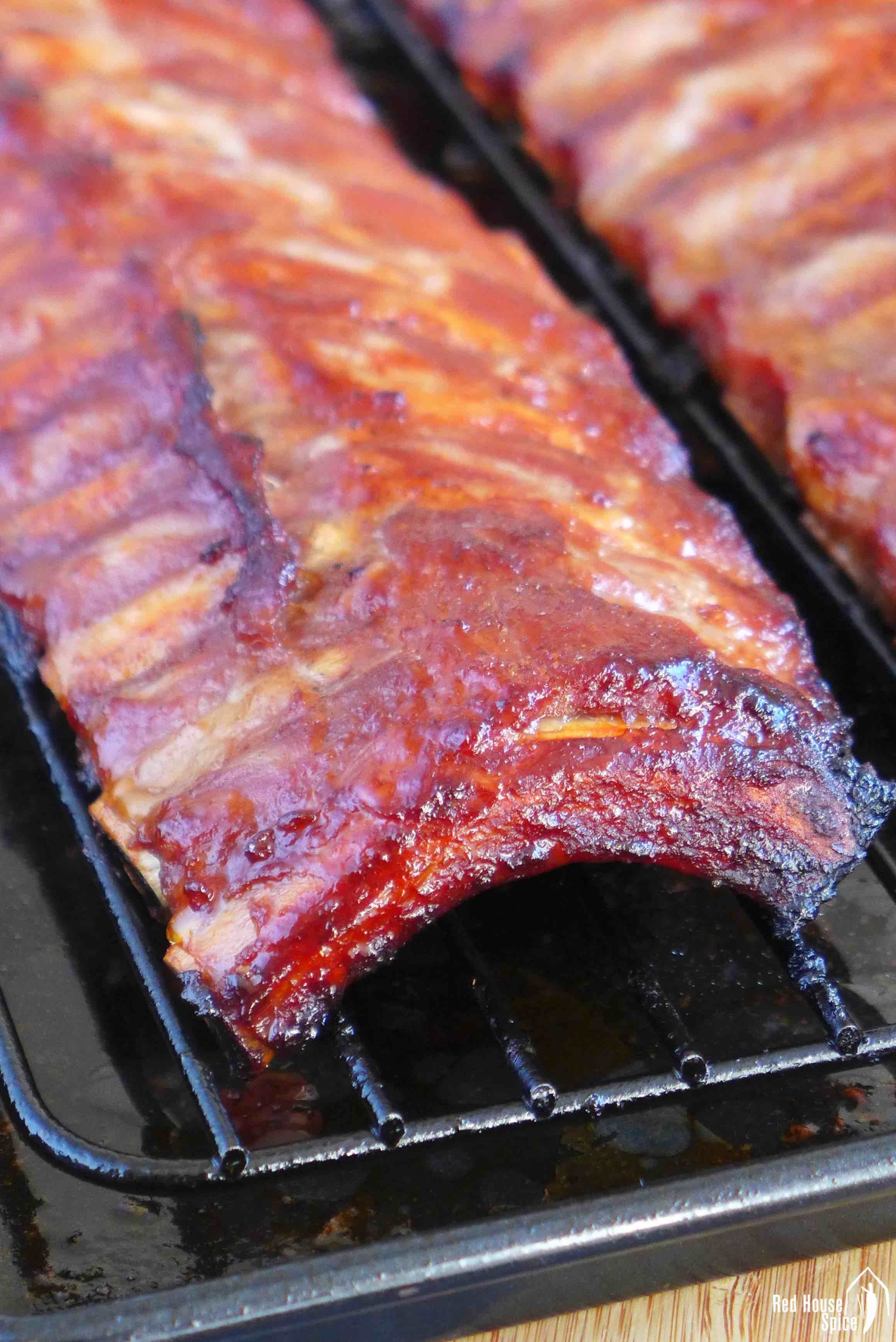 cooked Char Siu ribs in baking tray.