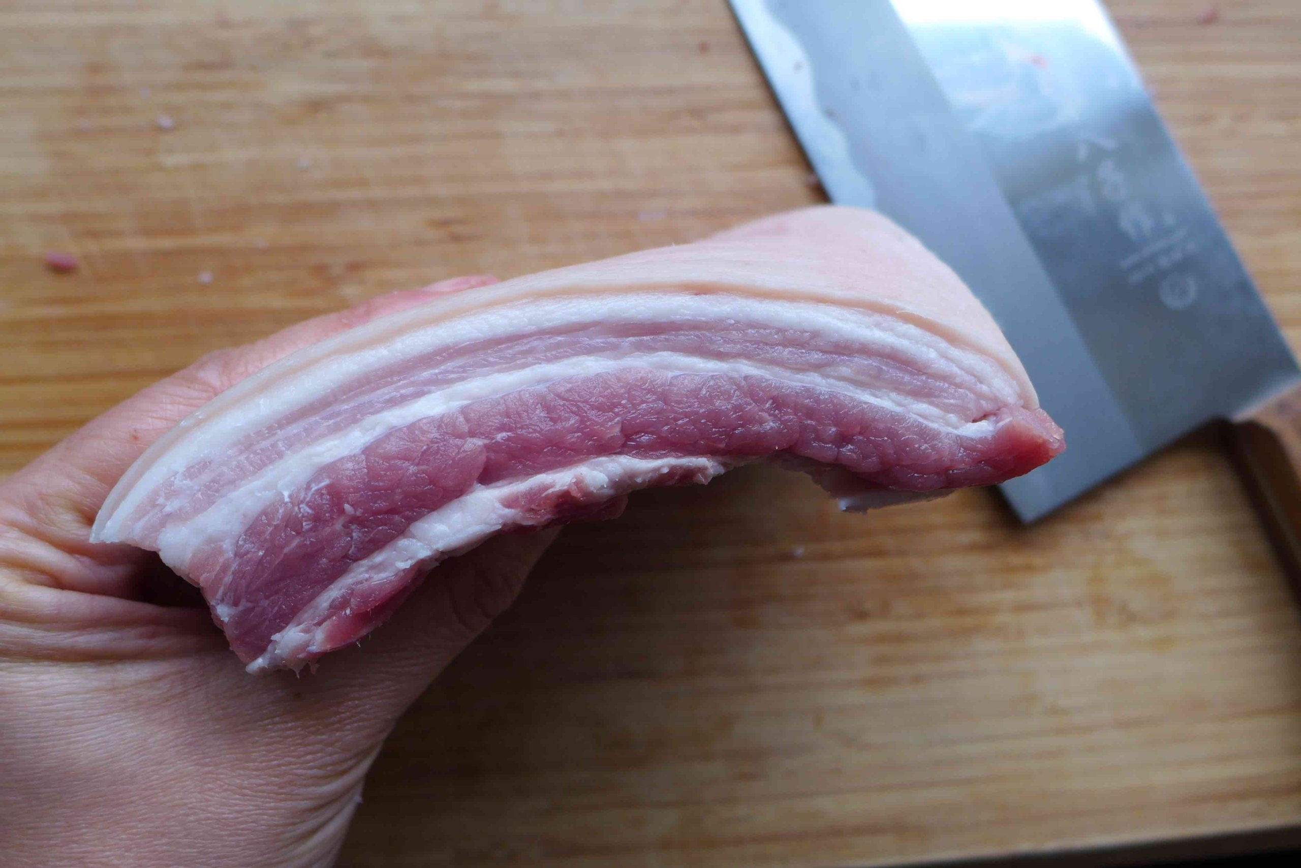 a block of raw pork belly.