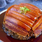 Mei Cai Kou Rou with overlay text that says steamed pork belly.