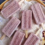 Six red bean popsicles on a tray that says red bean popsicles.
