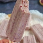 one red bean popsicle bitten on the top.
