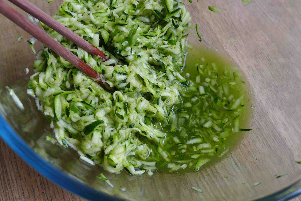 salted grated zucchini with liquid.
