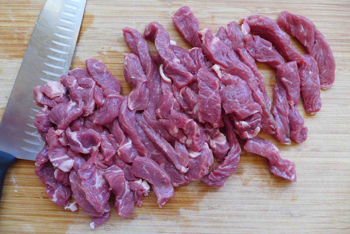 beef steak cut into strips.