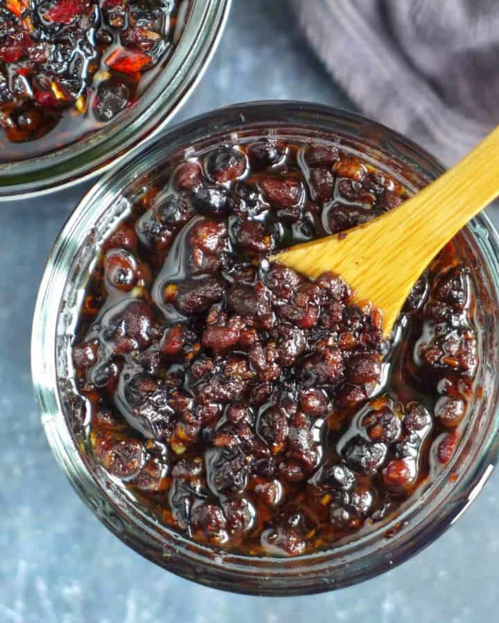 black bean sauce with a spoon.