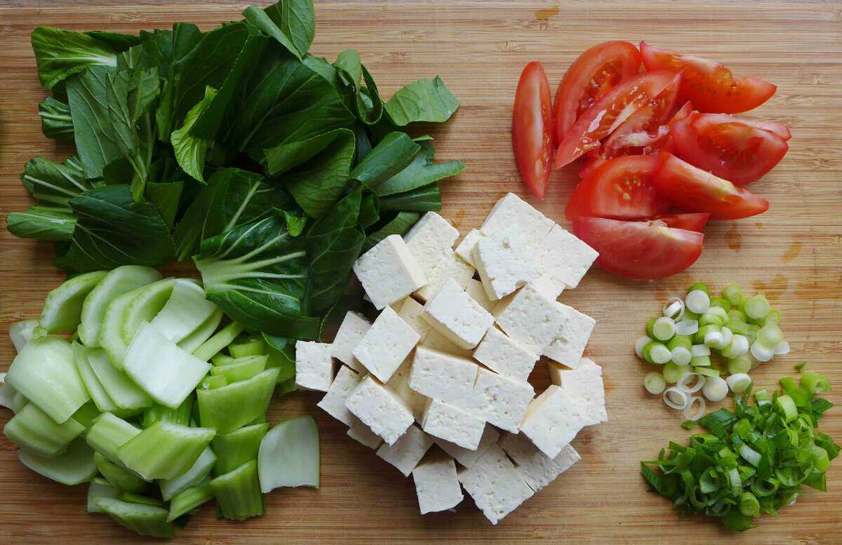 tofu and vegetables cut into small pieces.