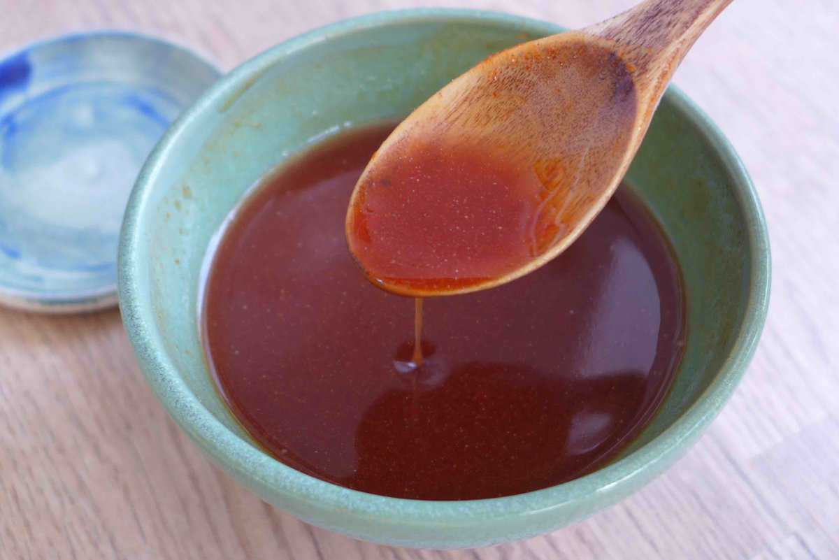 mixing sweet and sour sauce.