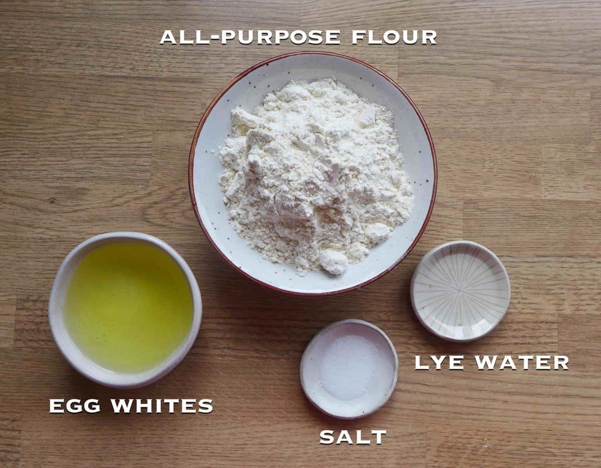 ingredients for wonton wrappers: flour, salt, egg whites and lye water.