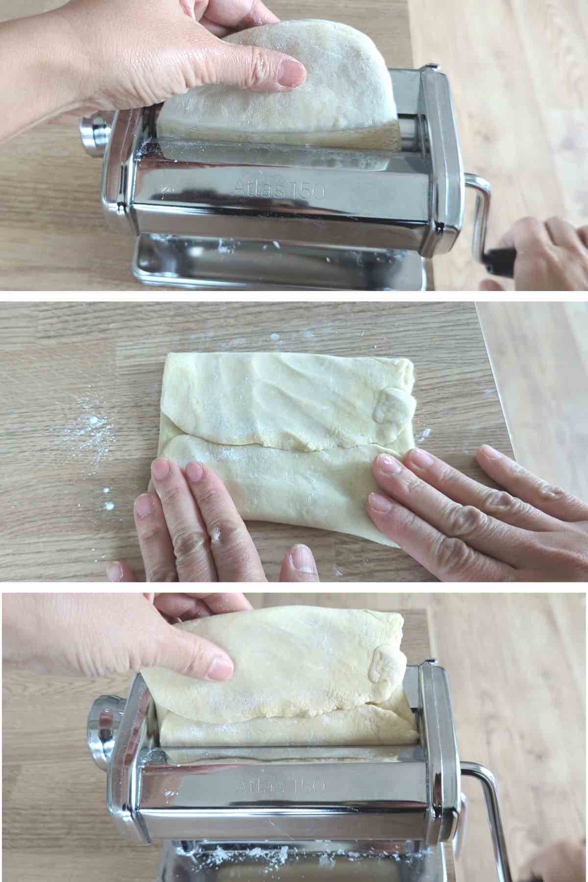 passing through a piece of dough through a pasta machine.