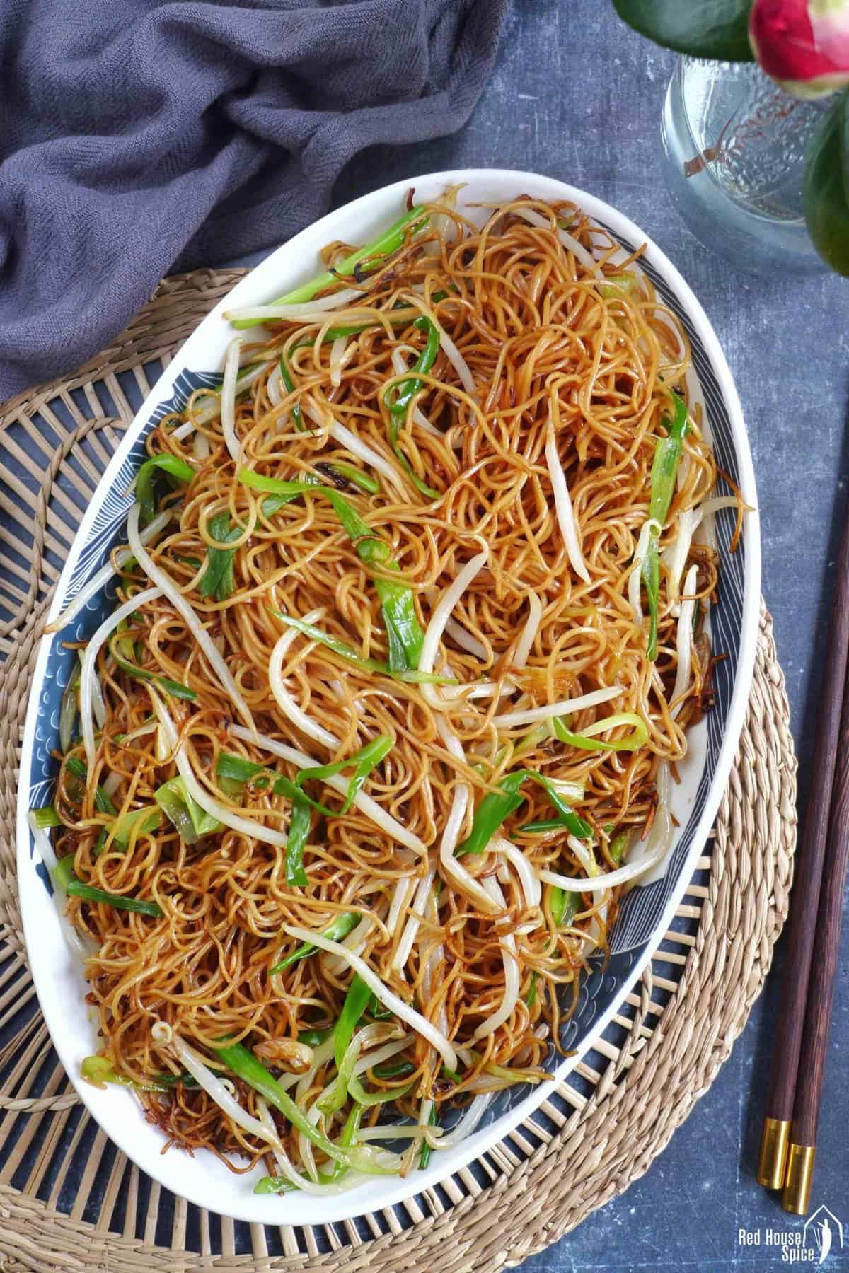 pan-fried noodles with scallions and bean sprouts.