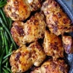 pan-fried chicken thighs with chili and cumin.