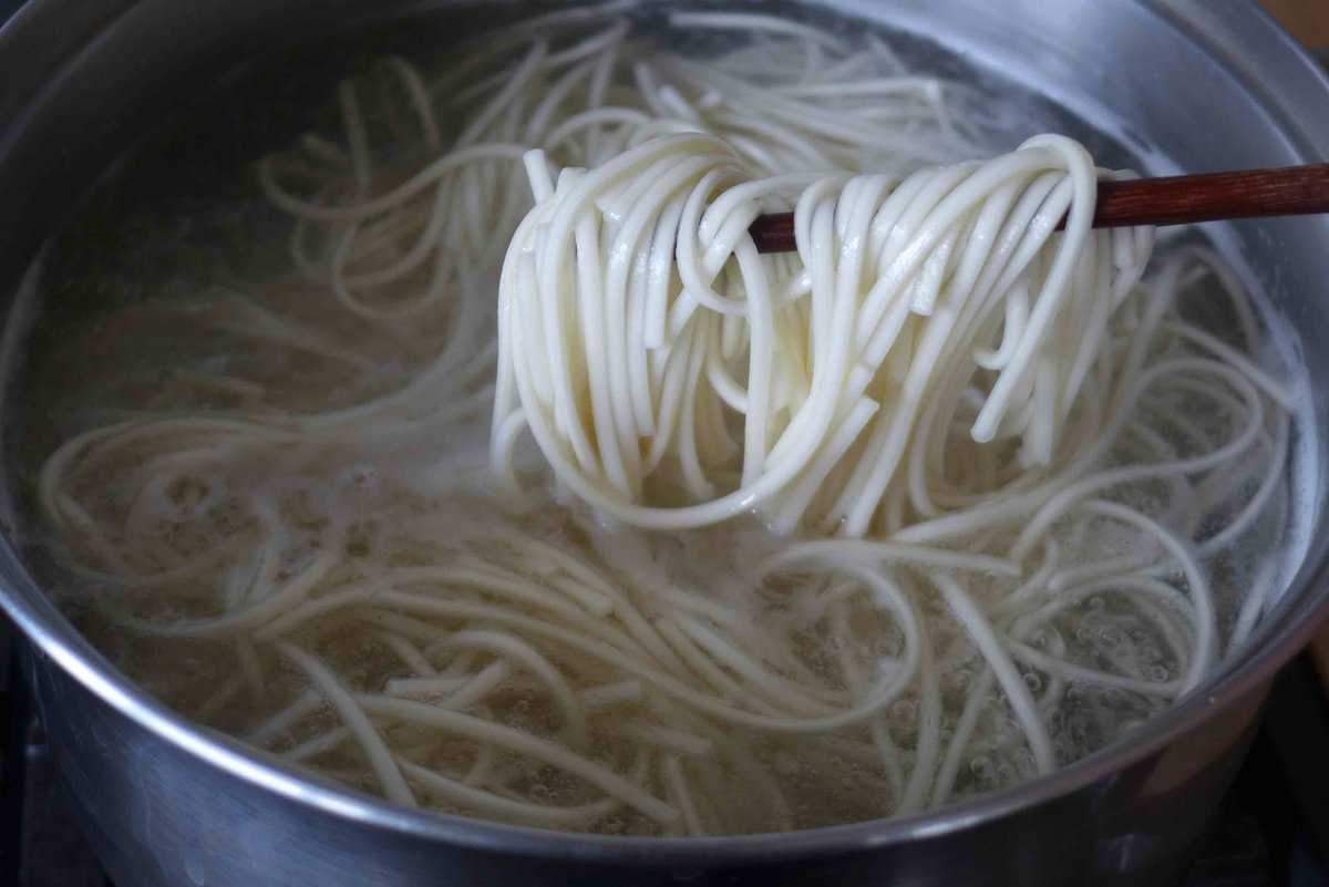 boiling noodles in water.
